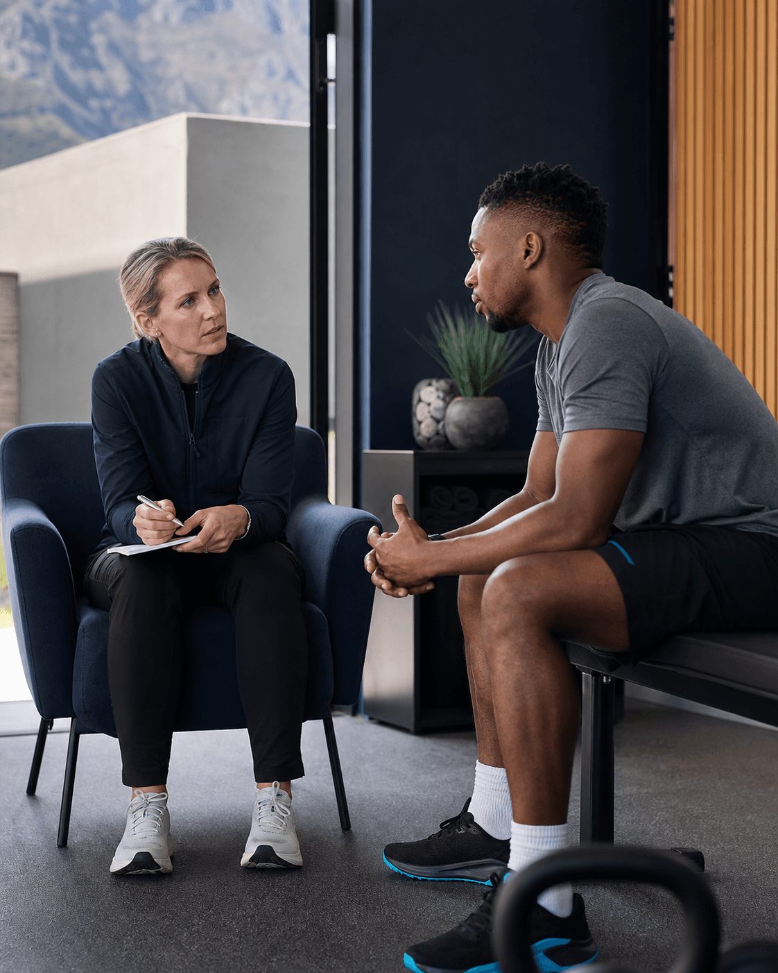 Performance practitioner and athlete in conversation